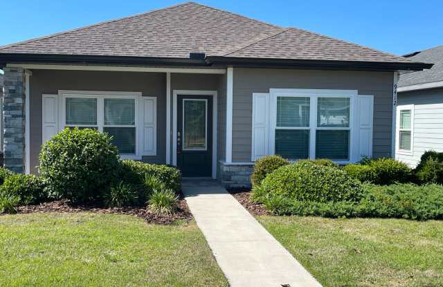 Welcome home to this beautifully maintained 3-bedroom, 2-bath residence located in the highly desirable Lugano community in Southwest Gainesville! photos photos