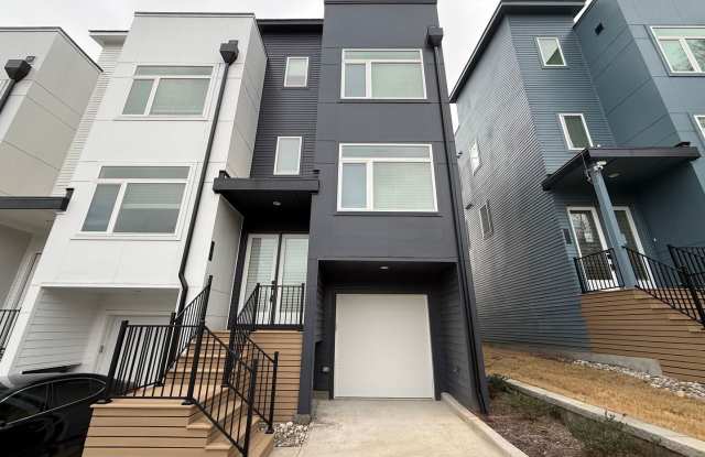**OFFERING RENT PROMOTION FOR THE FIRST 6 MONTHS, REFUNDABLE APPLICATION FEES & $200 MOVE IN PROMOTION** Luxurious New Construction End Unit 4BD, 4BA Downtown Raleigh Townhome with Rooftop Terrace photos photos