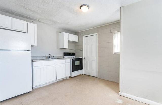 Updated 2-Bed, 1-Bath Townhouse Just Minutes from Downtown Raleigh photos photos