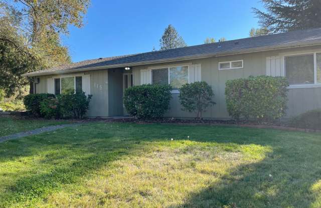 Welcome to This Charming 3 Bedroom Two Bath with a large fenced back yard Gallery 1