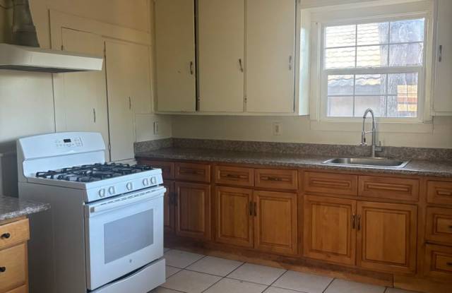 3 Bed/2 Bath with additional bonus room. Detached garage and LARGE yard space!! photos photos