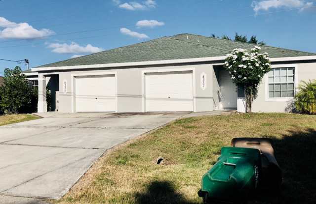 Experience this 3 bedroom 2 bath duplex with 1 car garage and screened in Lanai. photos photos