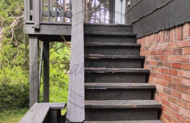 ONE MONTH FREE RENT: Second Floor One Bedroom Updated Apartment with Laundry Hook Ups! Gallery 2