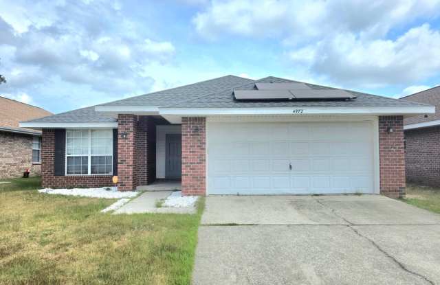 Charming 4BR/2BA Brick Home with Solar Panels photos photos