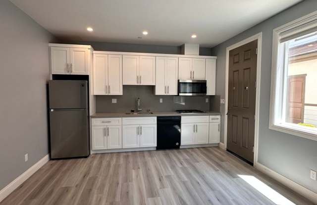 Attached separate first floor 1-bedroom, 1-bathroom suite photos photos