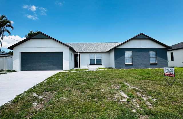 Modern 4-Bedroom Pool Home with Double Garage in the Heart of Cape Coral photos photos