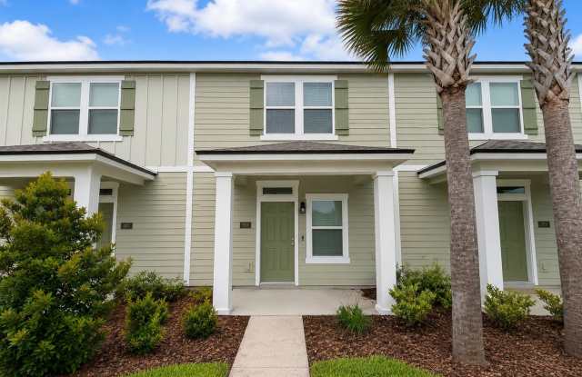2BR/2.5BA Move-In Ready with Garage & In-Unit Laundry – Just Minutes from Oakleaf Town Center! Lawn Care Included! photos photos