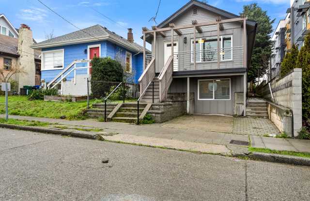 Three Bedroom Fremont Home with a Private Lower Level Suite, Fenced Yard and Driveway Parking Gallery 1