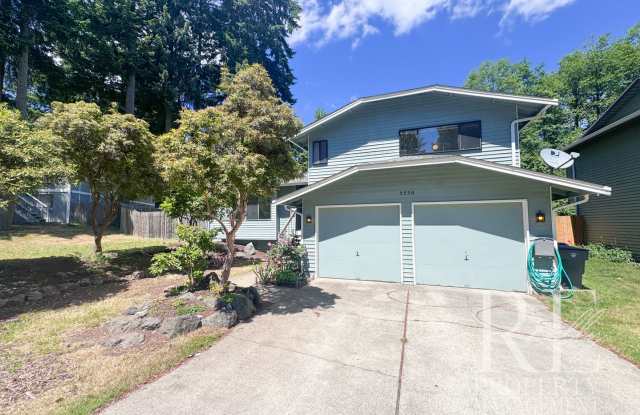 Spacious Poulsbo Home with Large Basement, Fenced Yard & Garden Space photos photos
