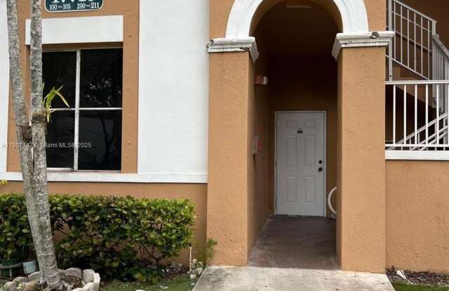 17710 NW 73rd Ave - 17710 Northwest 73rd Avenue, Country Club, FL 33015