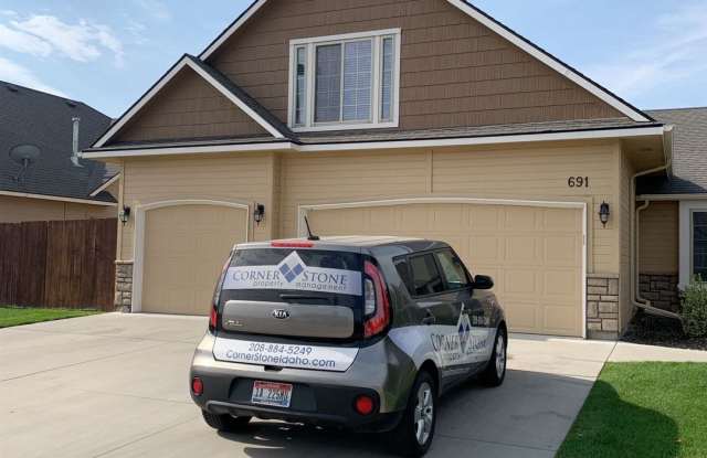 Spacious Home In Kuna with Bonus Room and Office! - 691 East Ridgestone Drive, Kuna, ID 83634
