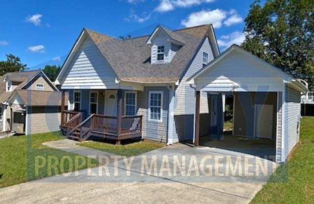 Charming three-bedroom home with carport! photos photos