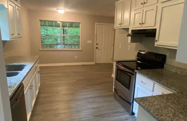 Charming 3-Bedroom Home with Basement and Covered Deck in Irondale, AL photos photos