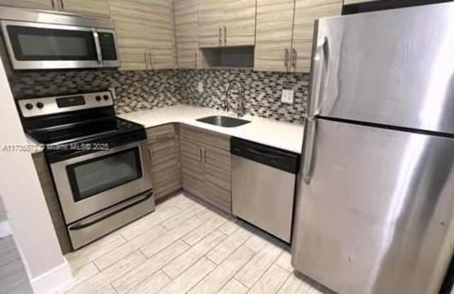 115 Menores Ave - 115 Menores Avenue, Coral Gables, FL 33134