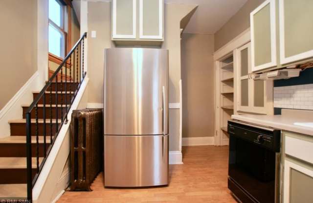 June 2025 ~ Cute 4 bedroom house. Spacious bedrooms. In unit laundry and dishwasher. - 1652 Marshall Avenue, St. Paul, MN 55104