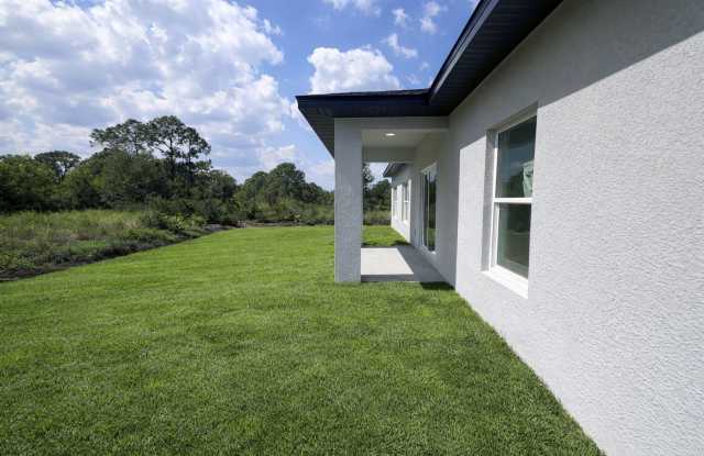 MODERN BRAND NEW 4BD/2BA RETREAT IN LEHIGH ACRES! photos photos
