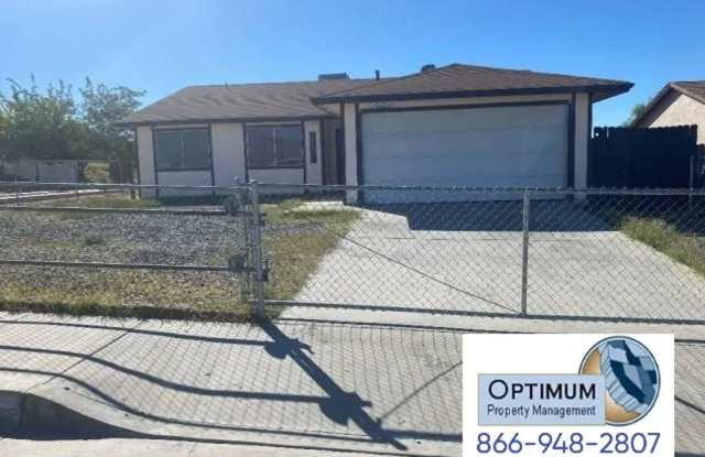 Charming 3-Bedroom Home with Large Backyard  Fenced Front Yard - 16043 Puesta Del Sol Drive, Victorville, CA 92394
