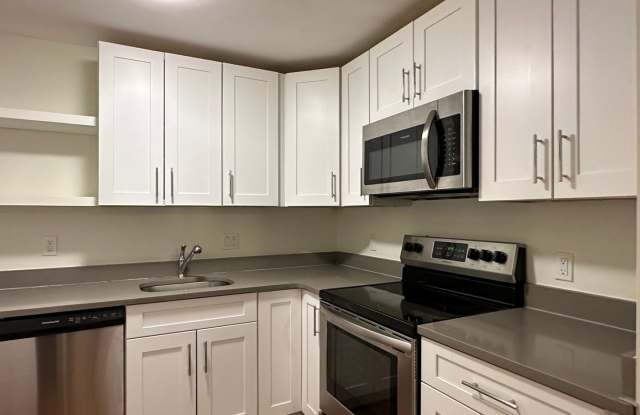 Huge 2 bed located near the Green Line with parking and in-unit A/C. photos photos