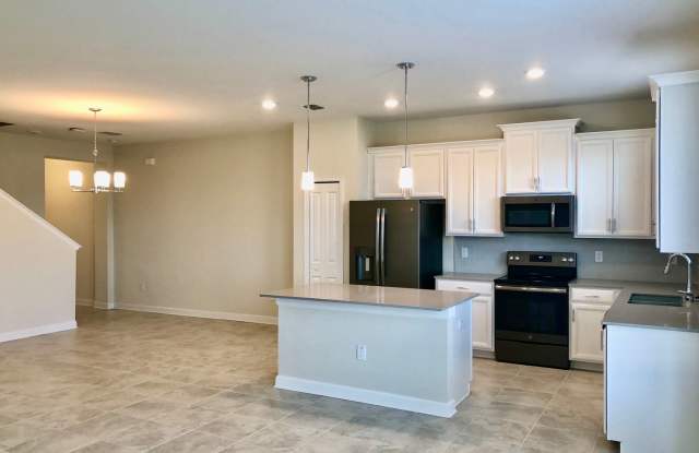 Townhome For Rent in Storey Lake - 3/2.5 with 2 car garage photos photos
