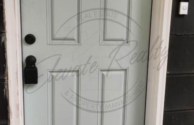 ONE MONTH FREE RENT: Second Floor One Bedroom Updated Apartment with Laundry Hook Ups! Gallery 3