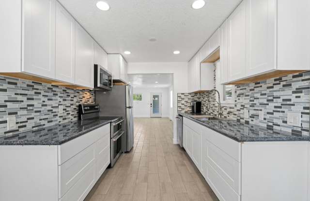 Complete Rebuild Modern Finishes 3 Bedroom 2 Bath Spokane Valley Home fenced backyard Gallery 4