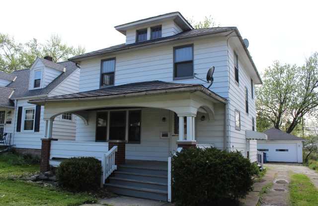Classic 3-Bedroom Colonial: Hardwood Floors, Fireplace, and Detached Garage! - 3320 Reid Avenue, Lorain, OH 44055