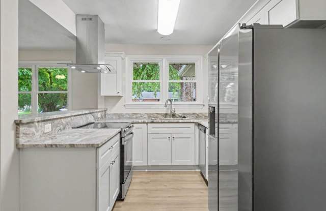 Recently renovated 3-bedroom, 3-bath home with a spacious fenced yard in Virginia Beach. Gallery 1