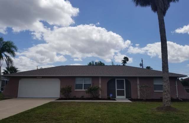SE area off Santa Barbara Blvd Single Family Home with a Fenced Yard - 138 Southeast 44th Terrace, Cape Coral, FL 33914