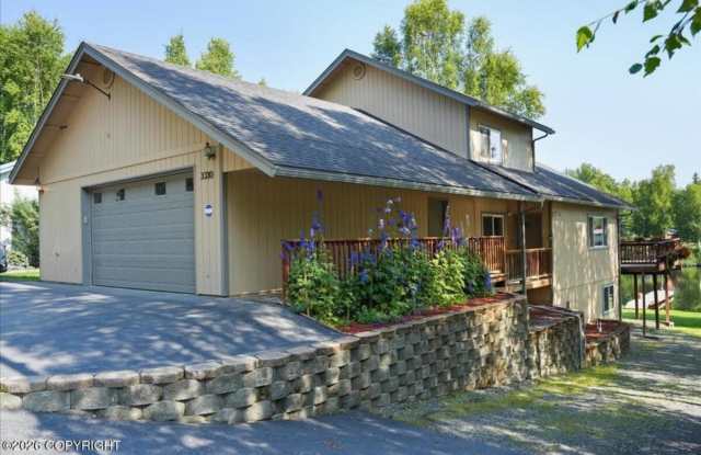 Fully Furnished Luxury Lake Living with private dock! 5 bedrooms/ 3 bathrooms/ 2 car garage and double kitchen/ living/ laundry areas plus separate entrances, perfect for multi generational families! Gallery 1