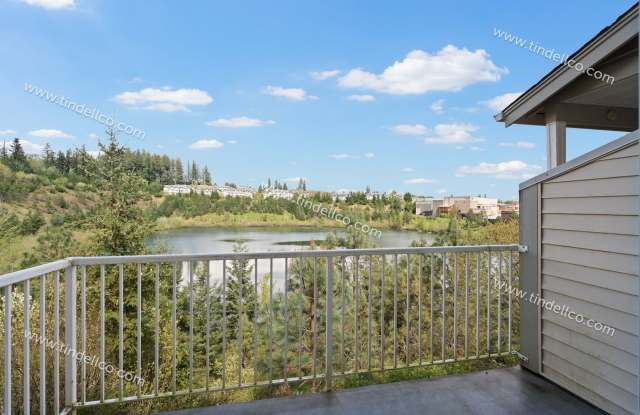 2ND MONTH FREE! Charming Townhome w/ Fireplace, Balcony & More Near Progress Ridge! photos photos