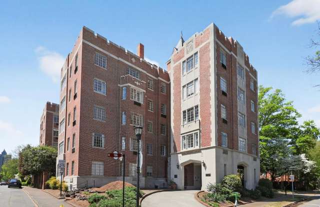 Absolutely stunning penthouse level unit in the historic Poplar building in Charlotte's tree lined Fourth Ward. photos photos