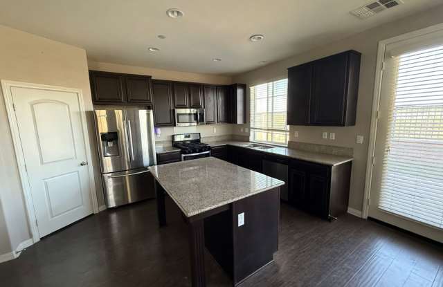 Charming 3BR Home with Modern Kitchen, Versatile Loft, & Private Backyard photos photos
