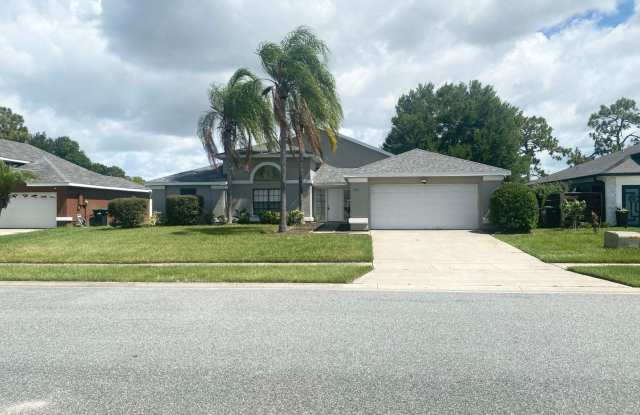 Spacious 3 Bedroom/2 Bath home in a gated community at Meadow Woods Village in Orlando Florida - 731 Virginia Woods Lane, Meadow Woods, FL 32824