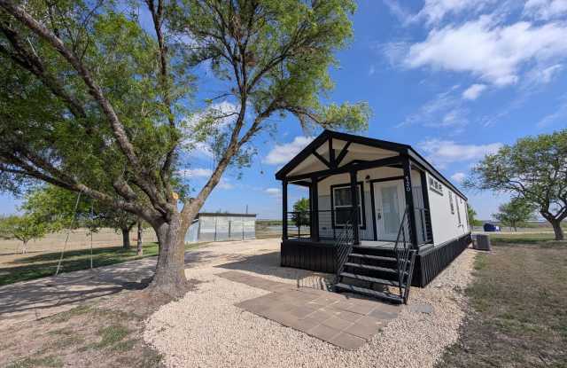Tiny Home - Farmhouse Style/ Fridge, Washer & Dryer Included / Super Cute / Covered Front Porch photos photos