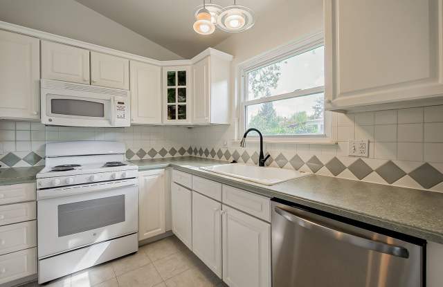 Spacious & Updated Novi Colonial | Vaulted Ceilings, Fireplace & Private Deck Gallery 3