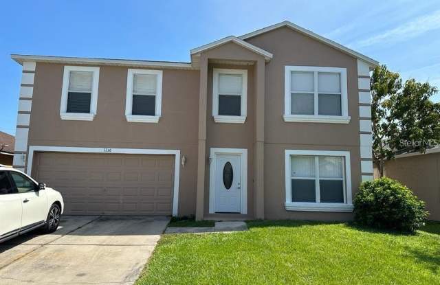 1136 EPSON OAKS WAY - 1136 Epson Oaks Way, Southchase, FL 32837