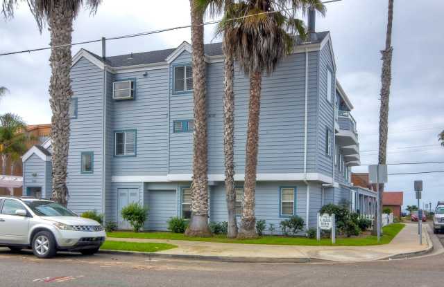 Cute 2 Bedroom Condo Steps Away from Endless Oceanside Beaches photos photos