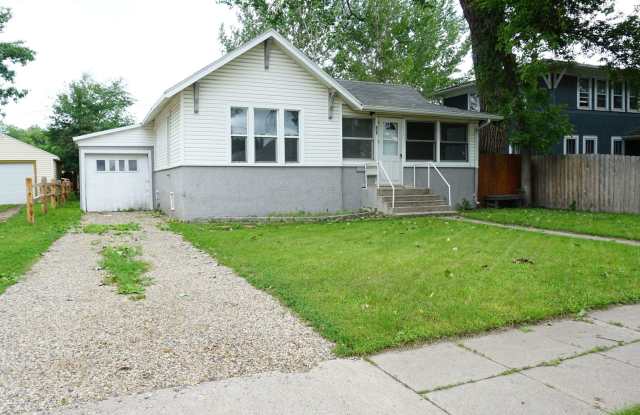 Charming Fully Remodeled Home with 4 Garage Stalls & Park Access in Central Minot photos photos
