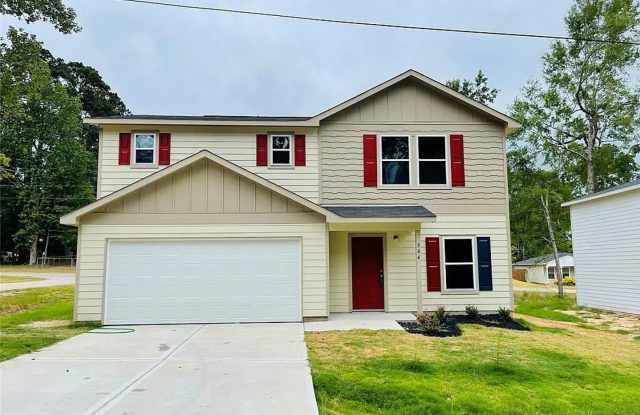 Beautiful New 2 story home in the gated Cedar Point Community in Lake Livingston!! photos photos