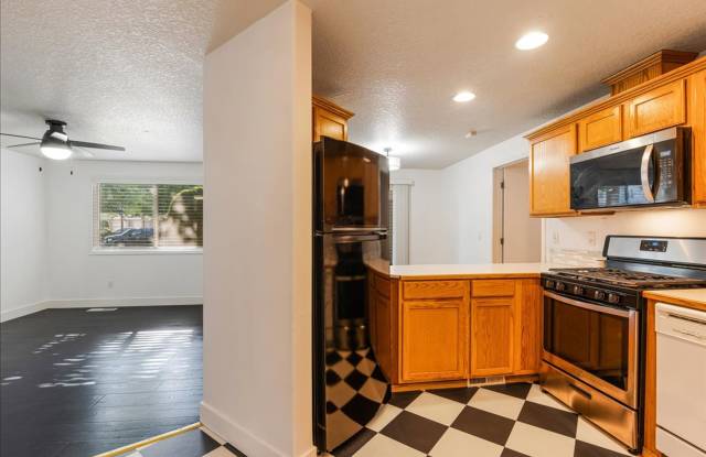 Versatile 4-Bedroom Corner Condo with Main-Level Suite photos photos