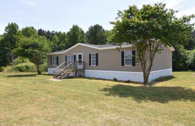 Spacious 3-Bed, 2-Bath Manufactured Home on a Serene County Lot — Enjoy Peaceful Living with Stunning Farmland Views! photos photos