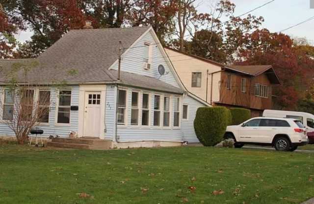 203 Hempstead Gardens Drive - 203 Hempstead Gardens Drive, West Hempstead, NY 11552