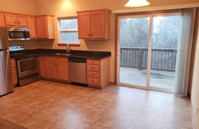 Washer  Dryer Included + West Side of Manhattan + Lawn Care, Snow Removal  Trash Provided! Available July 6th! - 712 Oakbrook Place, Manhattan, KS 66503