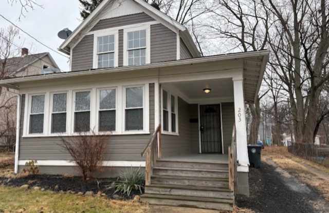 Classic Akron Home, Modern Convenience: Deck, First Floor Bedroom  Laundry and 2 Sunroom's photos photos