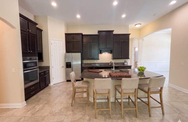 Spacious 4BR/3BA Home with 3-Car Garage, Bonus Office & Covered Patio in St Johns! photos photos