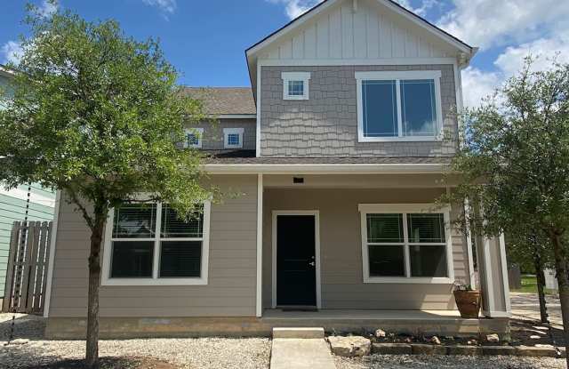 This charming two-story home, built in 2018, offers a spacious open floor plan perfect for casual entertaining! photos photos