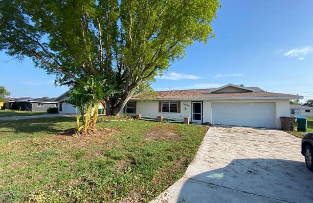 Spacious Cape Coral Home with Fireplace  Fenced Yard - 1003 Southeast 26th Street, Cape Coral, FL 33904