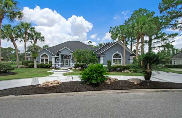 Absolutely beautiful home in Hidden Hills Country Club with golf and water views! Gallery 3