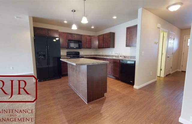 South Bay Townhomes - 4021 29th Street Southeast, Morton County, ND 58554