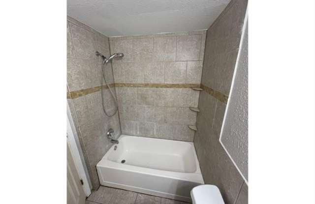 Discover your dream home in this beautifully renovated four-bedroom, two-bathroom house. Gallery 4